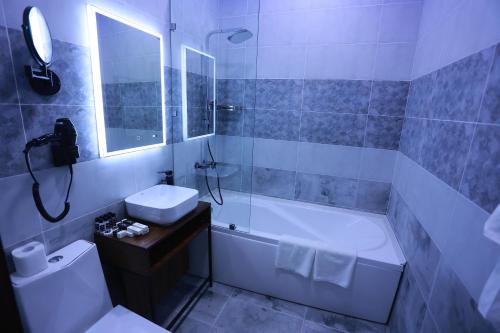 Bathroom, Regal Hotel by Grand in Navoi