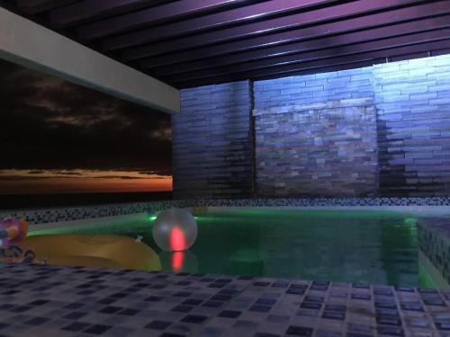 Swimming pool, The Palms Resort & Bar in San Narciso