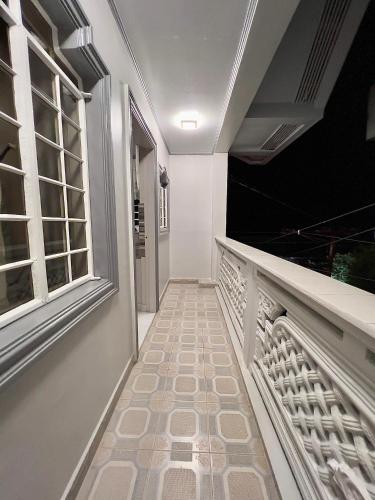 Balcony/terrace, NEW Modern Vacation Home Apartelle in San Roque