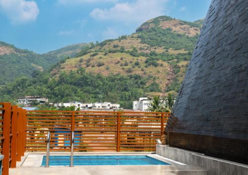 SaffronStays Urja, Lonavala - Private villa with 2 pools, spa room, jacuzzi, private elevator & waterfall