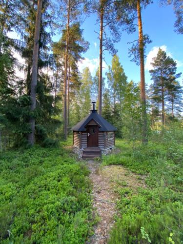 A Unique cottage in a pine forest by the lake