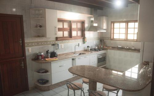 Konyha, Nômades Riverside - Adventure Hostels & Coworking (Nomades Riverside - Adventure Hostels & Coworking) in Barra da Lagoa Beach