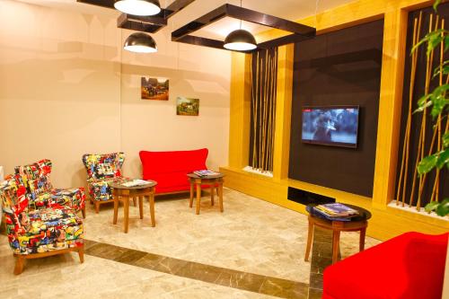 Koplietošanas atpūtas telpa ar TV, Fayton Hotel in Akhisar