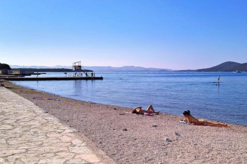 Strand, Apartments by the sea Jadrija, Sibenik - 6147 in Jadrija