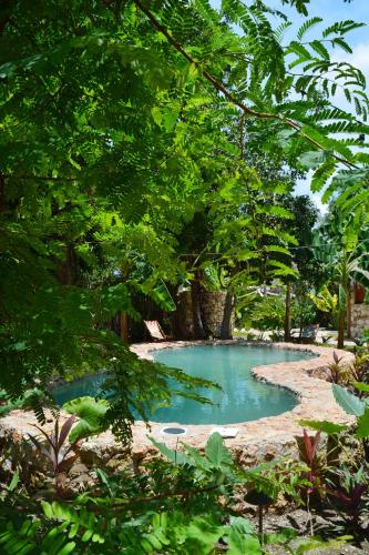 Aldea Che-Eek , con acceso a club de playa privado y desayuno incluido – Bacalar, TX