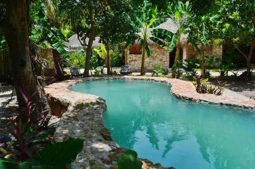 Aldea Che-Eek , con acceso a club de playa privado y desayuno incluido – Bacalar, TX