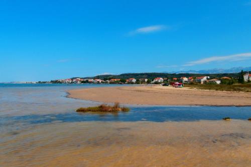 Seaside apartments with a swimming pool Ljubac, Zadar - 11922