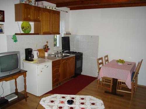 Apartments with a parking space Kampor Rab - 5014 - image 6