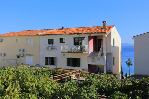 Apartments by the sea Igrane, Makarska - 6653