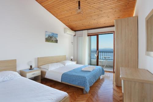 Apartments by the sea Igrane, Makarska - 6653