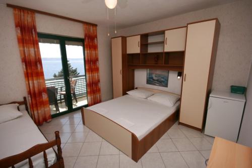 Apartments by the sea Zivogosce - Porat Makarska - 4878 - image 4