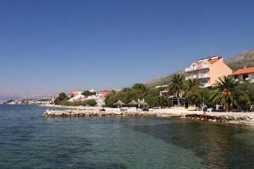  Apartments by the sea Podstrana, Split - 8677, Pension in Sveti Martin