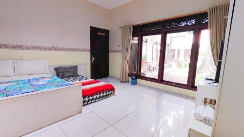 Homey Guesthouse near Sby Zoo Syariah