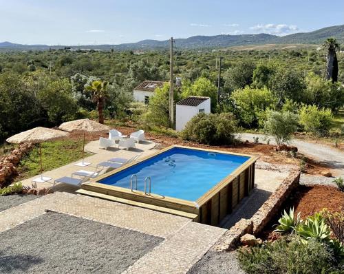 Swimming pool, Casa Colinas Roxas by Portucasa in Olhao