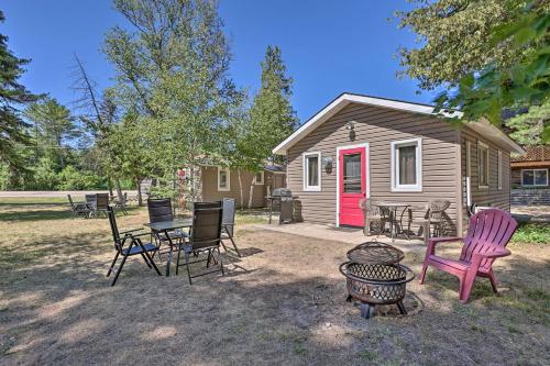 Cozy Suttons Bay Cottage with Shared Dock and Fire Pit