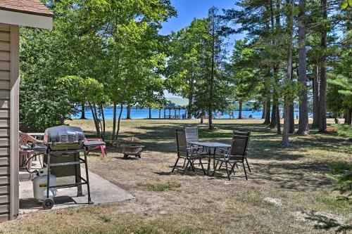 Cozy Suttons Bay Cottage with Shared Dock and Fire Pit