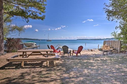 Cozy Suttons Bay Cottage with Shared Dock and Fire Pit