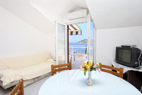 Three-Bedroom Apartment with Terrace and Sea View room in Family friendly seaside apartments Razanj Rogoznica - 10373