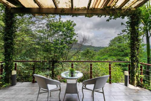 Balcony/terrace, Mawi Infinitty Villa by StayVista - A lake-view villa with an infinity pool for a luxurious stay near NATURAL Lake View