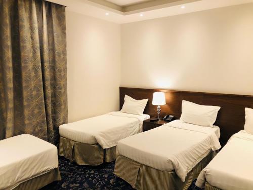 Zaha Al Munawara Hotel Room Type - Standard Quadruple Room