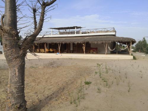 Grande maison en bordure de plage