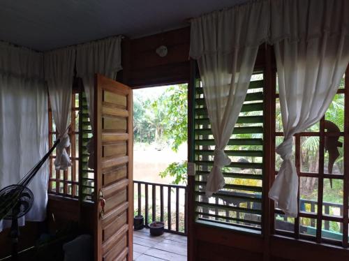 Балкон, Cabañas Dechi (Cabanas Dechi) in Пуерто-Наріньо