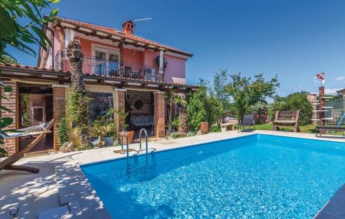 Family friendly apartments with a swimming pool Fratrici, Umag - 14384