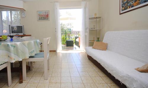 Three-Bedroom Apartment with Terrace and Sea View
