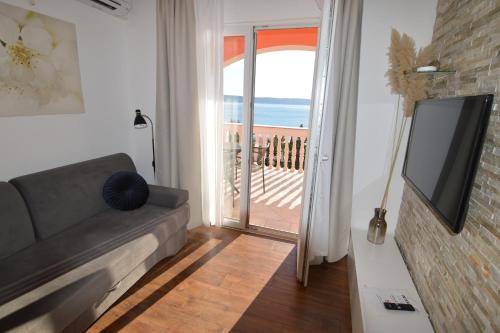 One-Bedroom Apartment with Terrace and Sea View