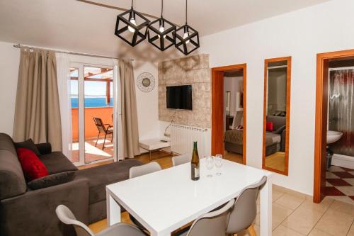 Three-Bedroom Apartment with Terrace and Sea View