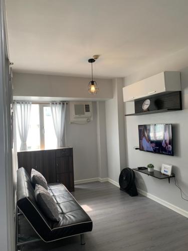 Cozy 1 Bedroom near Alabang Town Center and Molito with Wifi and Netflix, Manila (fotografie 2)