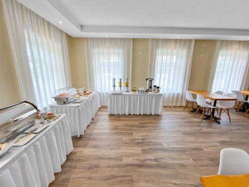 TOSCANINA Garni Hotel