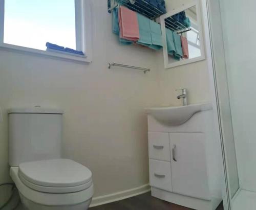 White weather board house, Auckland (Foto 5)