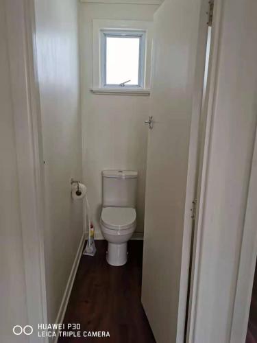 White weather board house, Auckland (Foto 6)