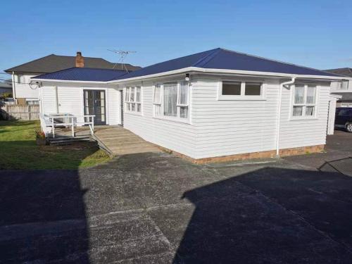 White weather board house, Auckland