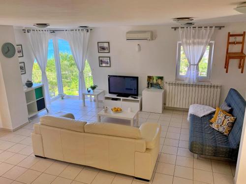 Two-Bedroom Apartment with Terrace and Sea View