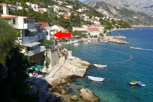  Apartments by the sea Pisak, Omis - 1003 in Mimice