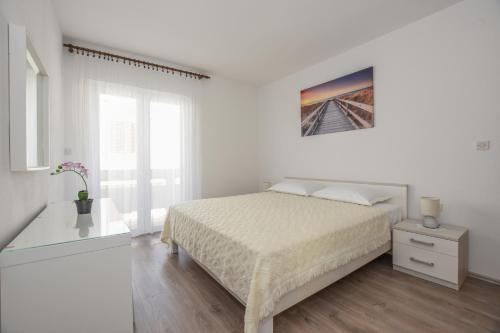 Two-Bedroom Apartment with Terrace and Sea View room in Apartments with parking space Pag - 18848