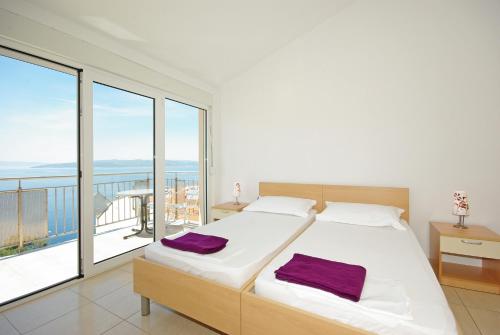 Apartments with parking space Krvavica, Makarska - 18911 in 加菲薩