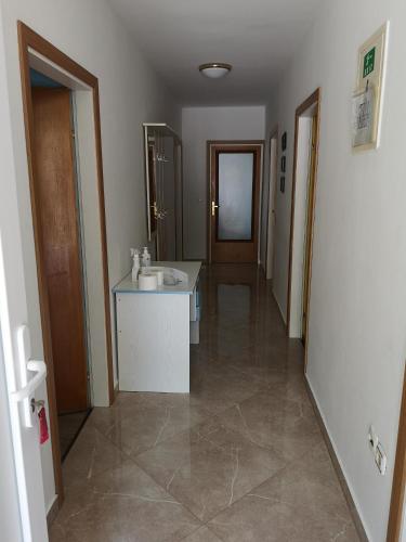 Three-Bedroom Apartment with Balcony image 1