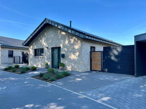 Ferienhaus mit Sauna am Harkebrügger See in der Nähe von Oldenburg