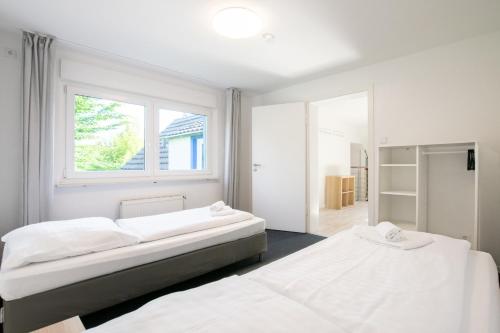 RAJ Living - 3 Room Apartments with Garden - 20 Min Messe DUS & Airport DUS