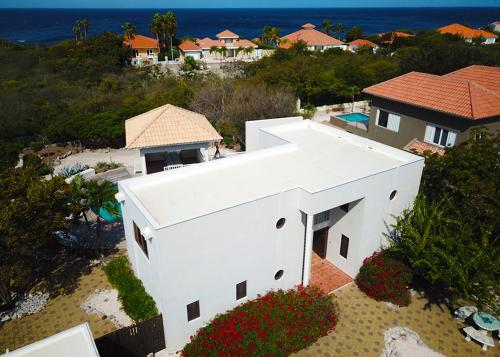 Exterior view, Coral Estate Villa 19 - architectural eye-catcher with private pool in Willibrordus