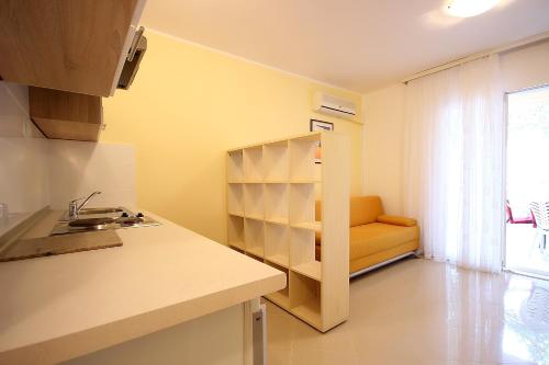 One-Bedroom Apartment with Terrace room in Apartments by the sea Novalja Pag - 4124