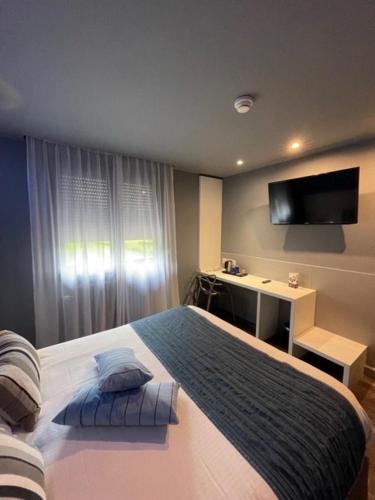 Foto - Hôtel Logis Restaurant La Fontaine