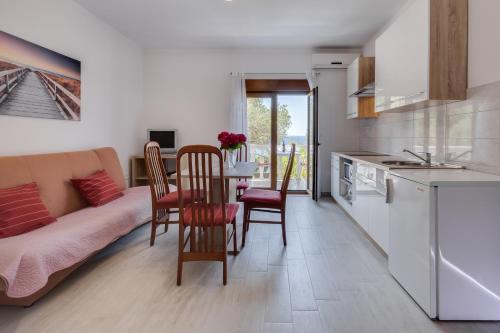 One-Bedroom Apartment with Balcony and Sea View