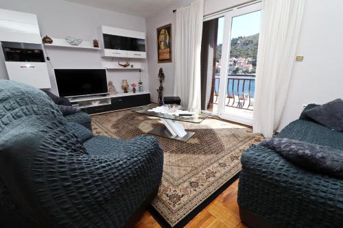Three-Bedroom Apartment with Terrace and Sea View