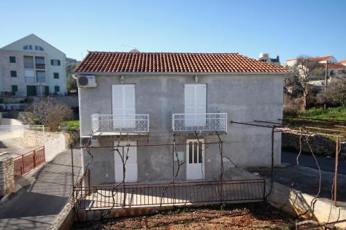  Apartments with a parking space Supetar, Brac - 6036 in Supetar