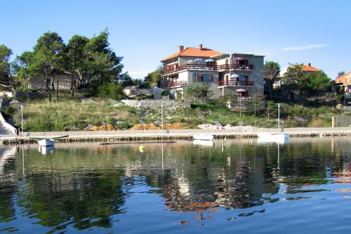  Seaside apartments with a swimming pool Nin, Zadar - 6153, Pension in Nin