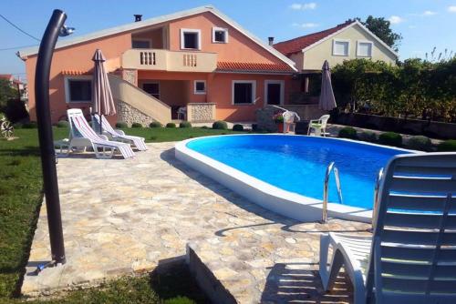 Apartments with a swimming pool Zemunik Donji, Zadar - 6188 - Murvica